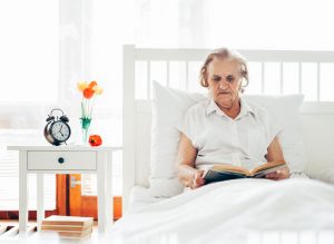 Elderly woman reading